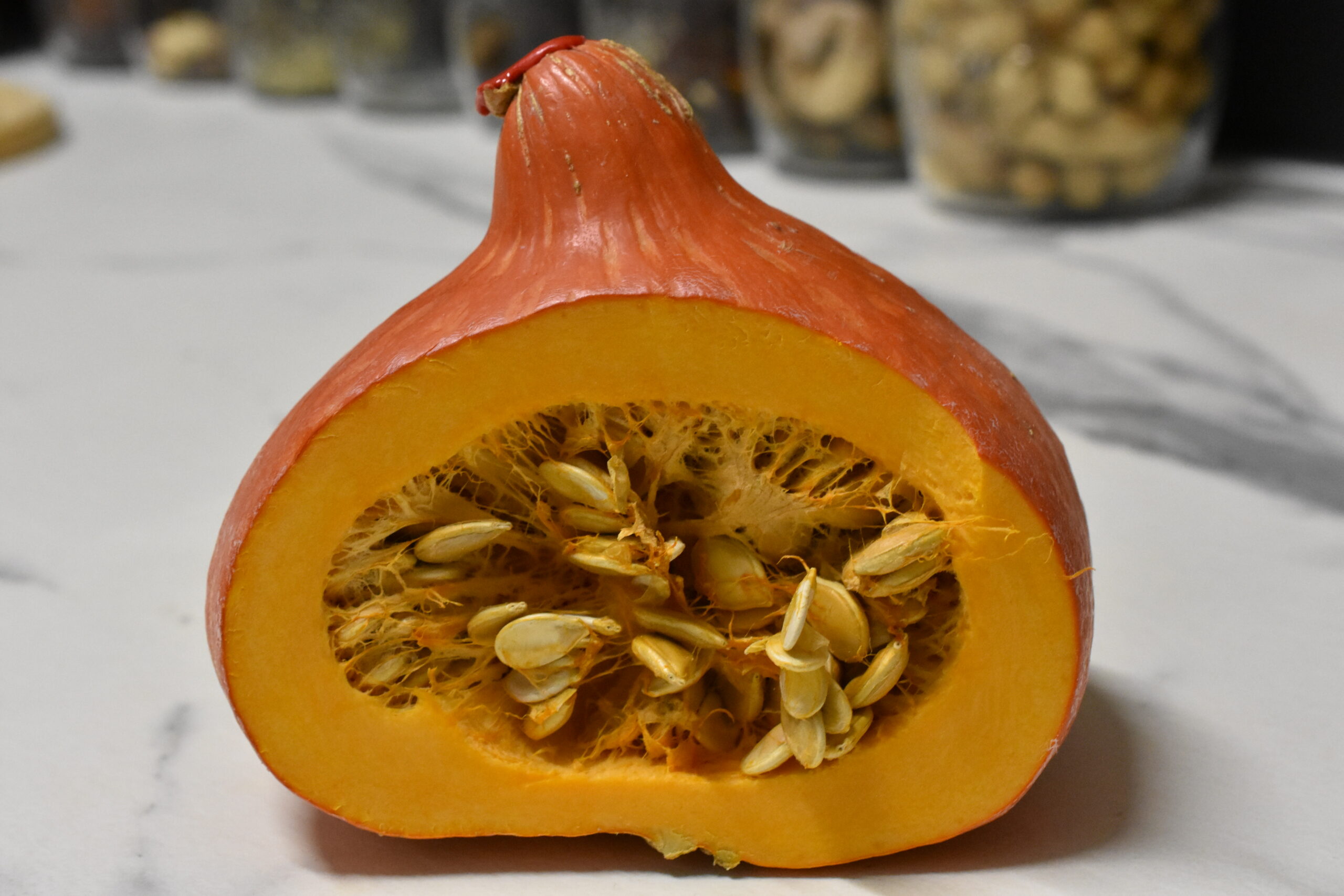 A Hokkaido pumpkin cut in half