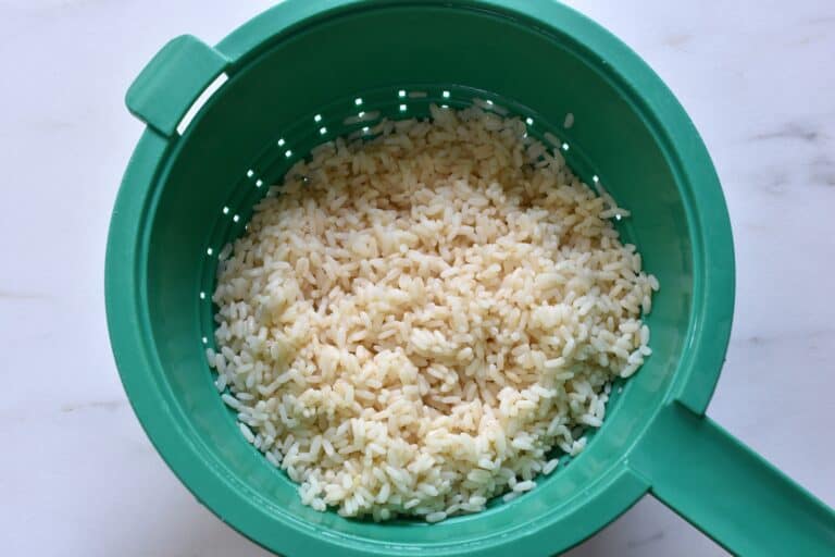 Ribe rice in a colander.