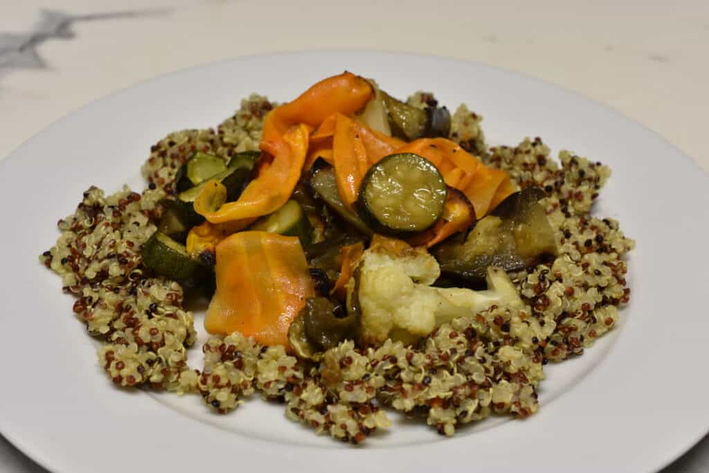 Oven roasted carrot, cauliflower and  courgette, on a bed of quinoa