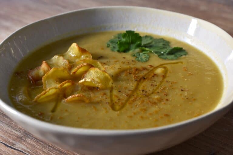 Close-up image of spicy parsnip soup in a white bowl