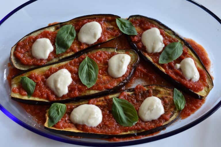 Add fresh basil leaves