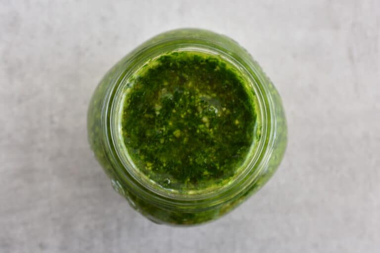 Wild garlic (ramsons) pesto in a glass jar