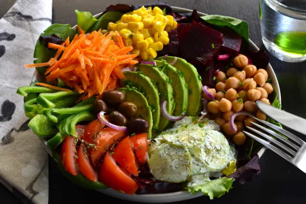 Rainbow mixed salad bowl.