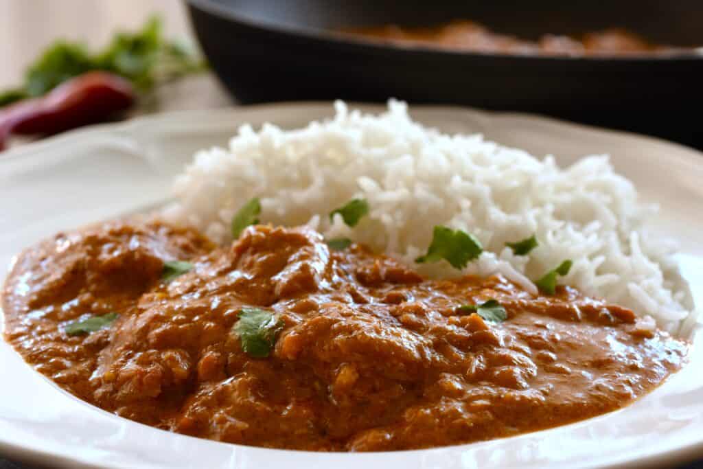 Vegan chicken tikka masala with steamed white basmati rice.