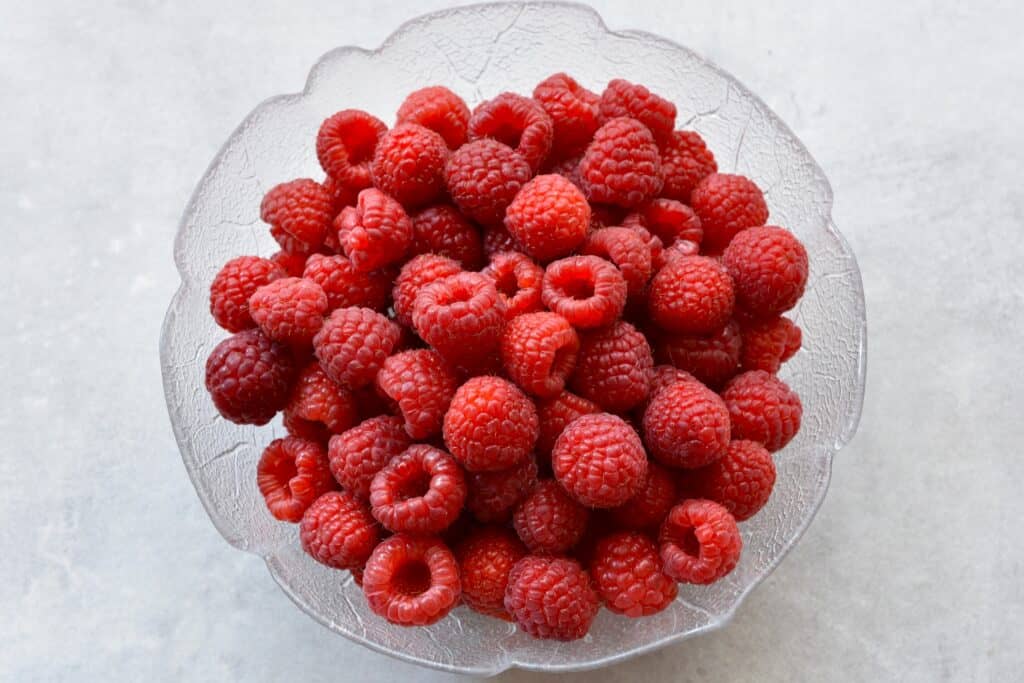 A bowl of fresh raspberries.