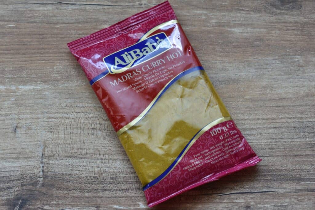 A packet of Alì Babà hot Madras curry powder.