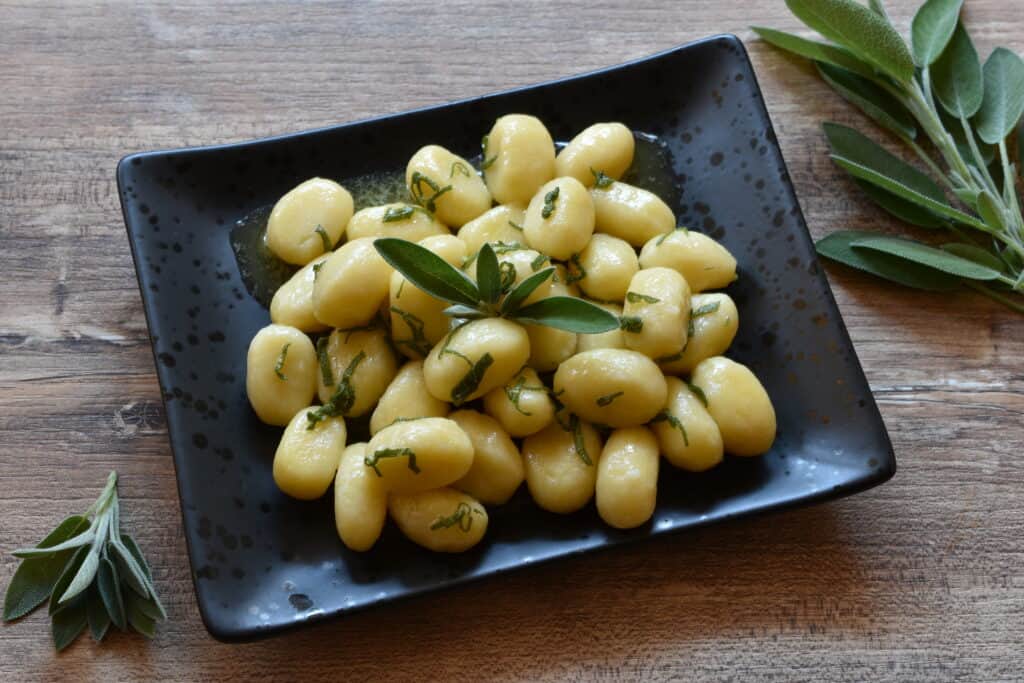 Homemade potato gnocchi with fresh sage and melted butter.