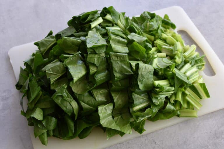 Chopped Italian erbette (perpetual spinach) on a chopping board.