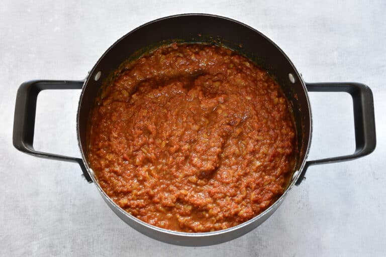 Curry paste (onion, Indian spices and tomato sauce) in a saucepan.