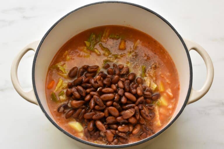 Vegetables and beans in a pan.