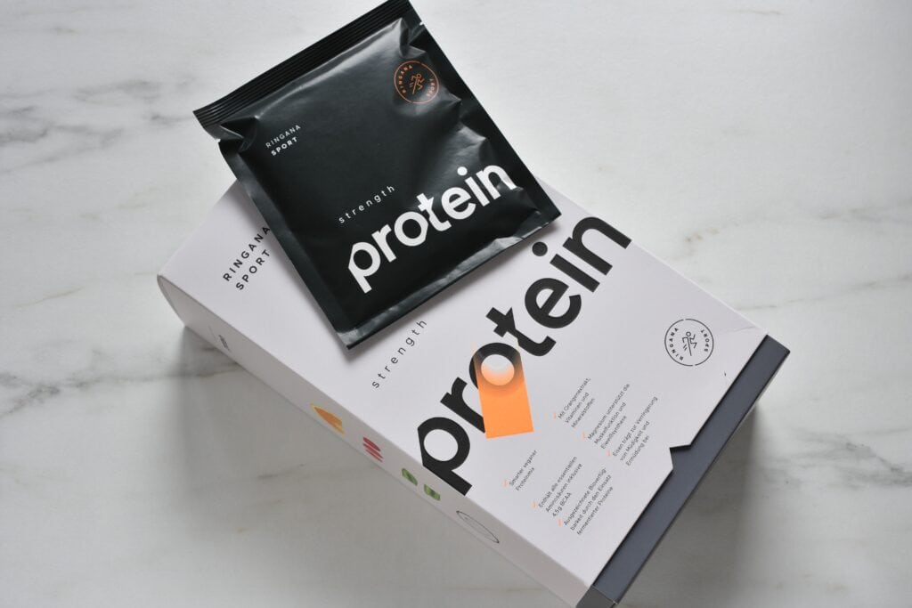 Ringana sport protein powder box and sachet.