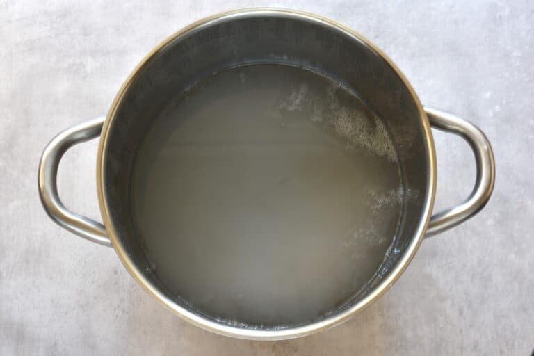 Dissolved soap, bicarbonate of soda and water in a pan.