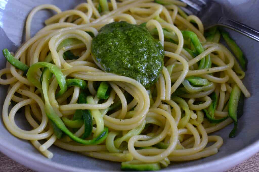 Spaghetti and spiralised courgettes with vegan basil pesto.