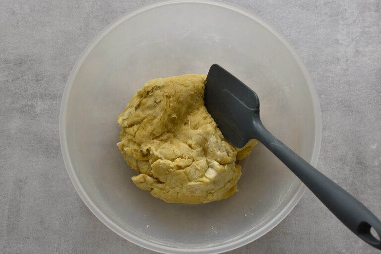 Pasta matta in a plastic bowl on a worktop.