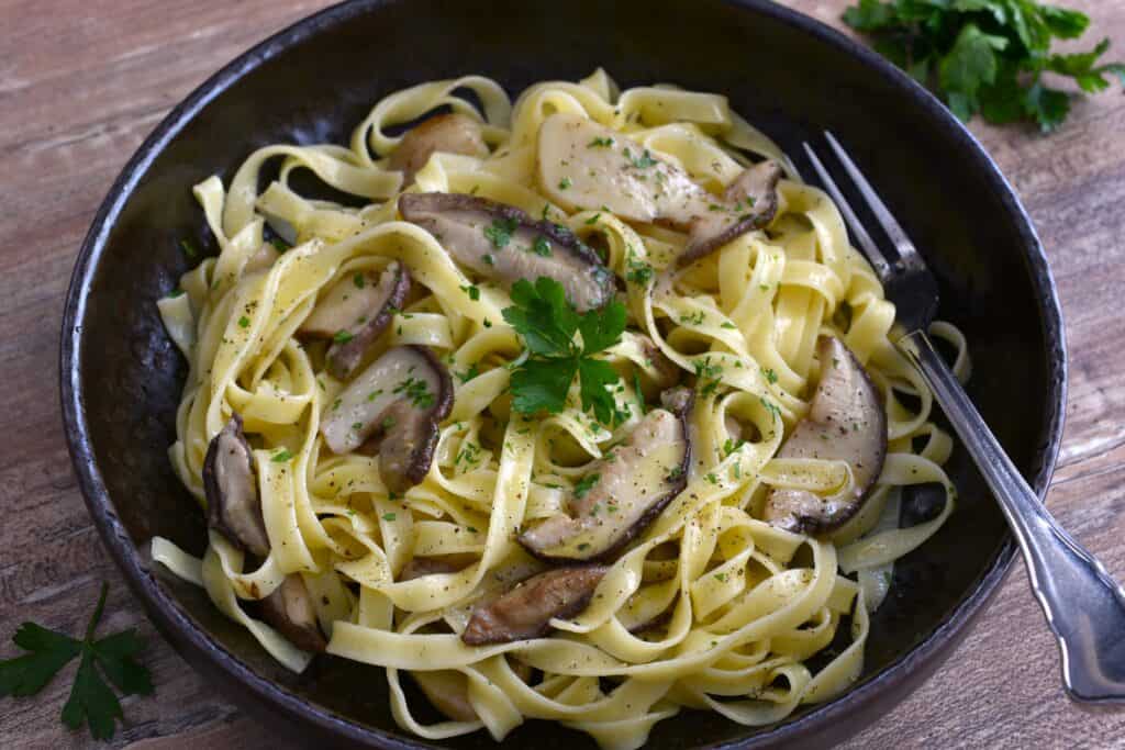 Tagliatelle with sautéed porcini mushrooms.